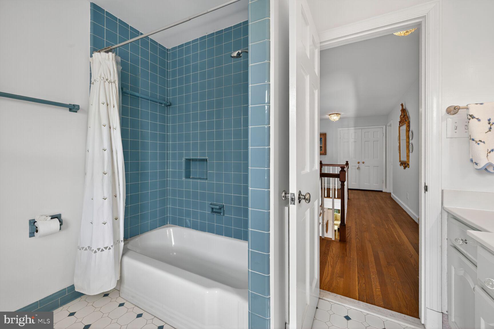 7200 Helmsdale Road Bethesda, MD 20817 - Photo 37 of 50 a bathroom with a tub a toilet and a shower