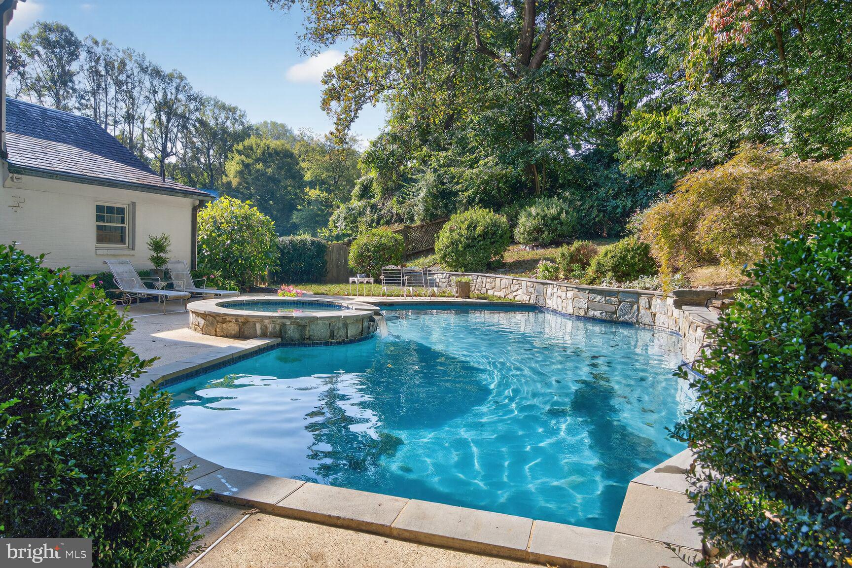 7200 Helmsdale Road Bethesda, MD 20817 - Photo 40 of 50 a view of a swimming pool with a patio