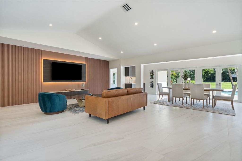 13900 Mustang Trail Southwest Ranches, FL 33330 - Photo 15 of 68 a living room with furniture and a flat screen tv
