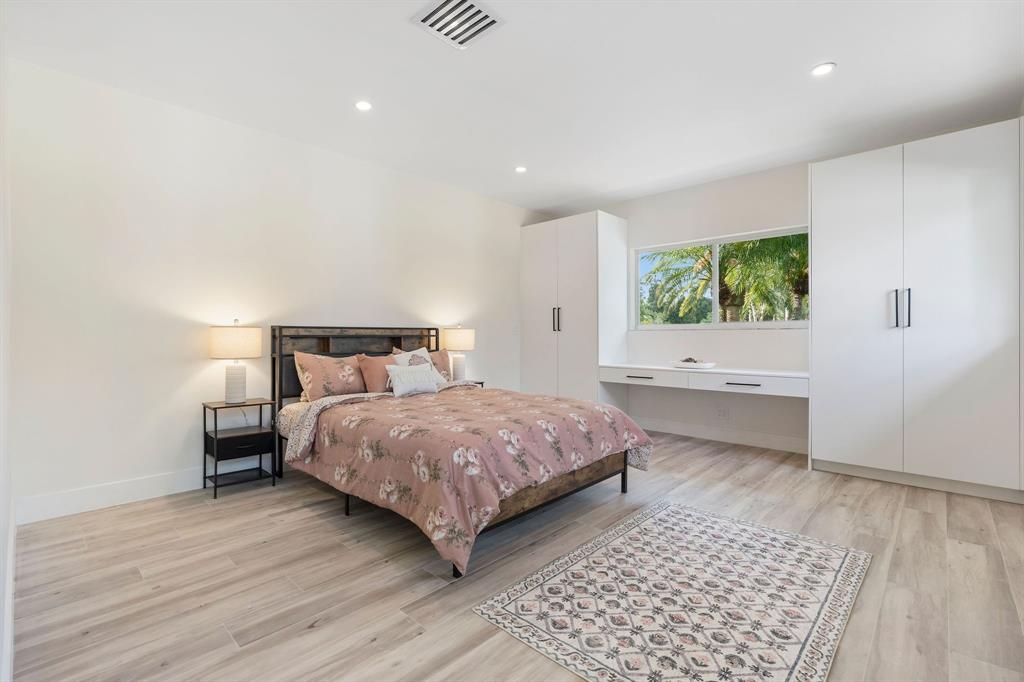 13900 Mustang Trail Southwest Ranches, FL 33330 - Photo 37 of 68 a bedroom with a bed and a window