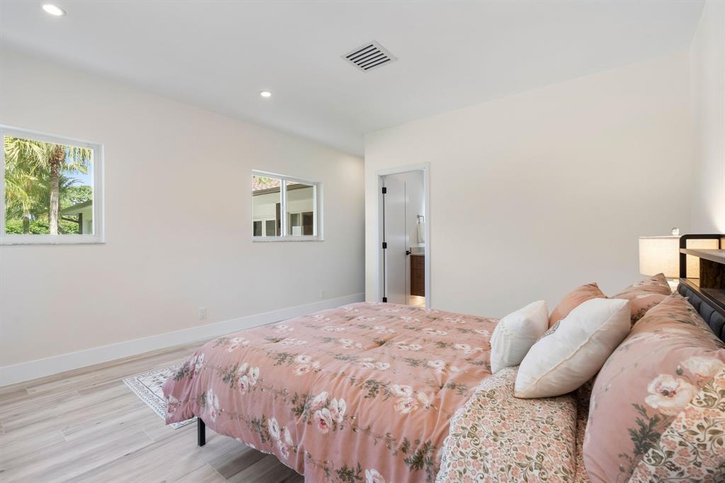 13900 Mustang Trail Southwest Ranches, FL 33330 - Photo 38 of 68 a bedroom with a bed and a window