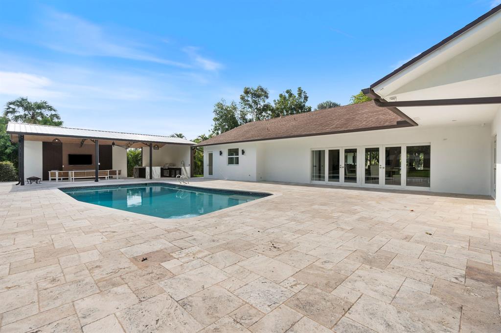13900 Mustang Trail Southwest Ranches, FL 33330 - Photo 53 of 68 a view of house with swimming pool outdoor seating