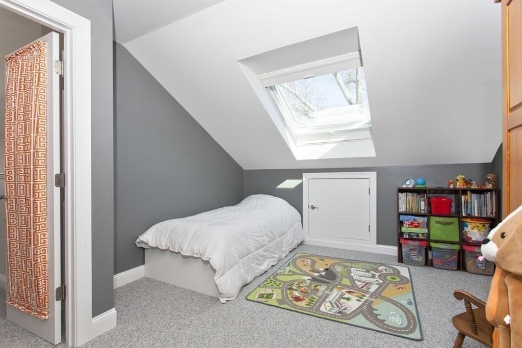 797 Highland Avenue, Unit 4 Needham, MA 02494 - Photo 12 of 21 a bedroom with bed and a window