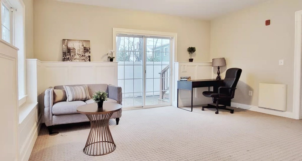 797 Highland Avenue, Unit 4 Needham, MA 02494 - Photo 15 of 21 a living room with furniture and a window