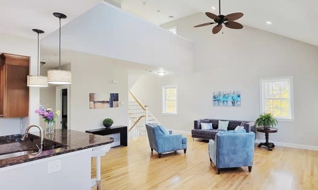 797 Highland Avenue, Unit 4 Needham, MA 02494 - Photo 3 of 21 a living room with furniture and wooden floor
