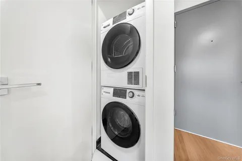 a utility room with dryer and washer
