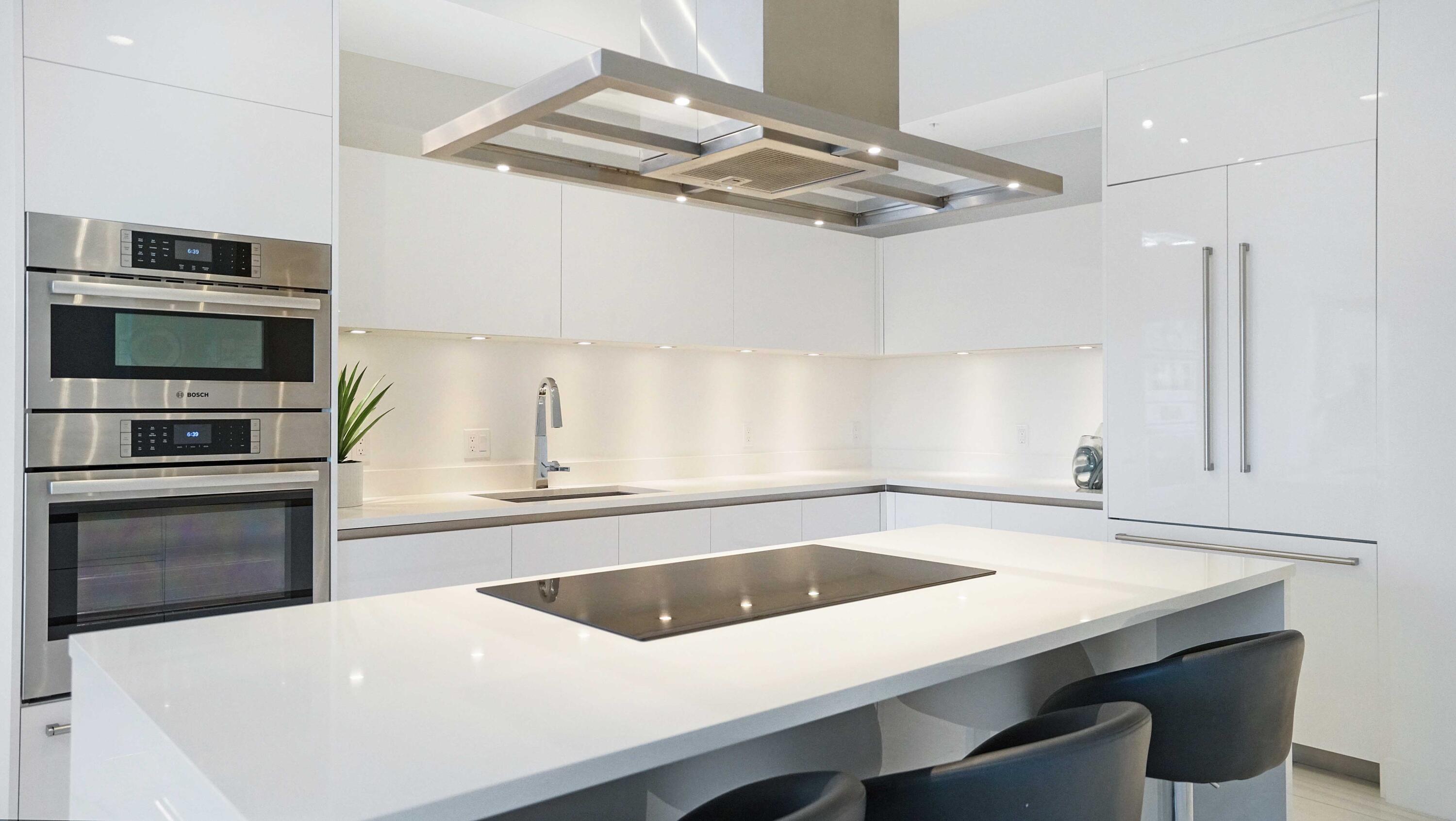 155 East Boca Raton Road, Unit 501 Boca Raton, FL 33432 - Photo 17 of 83 a kitchen with a sink a stove and microwave