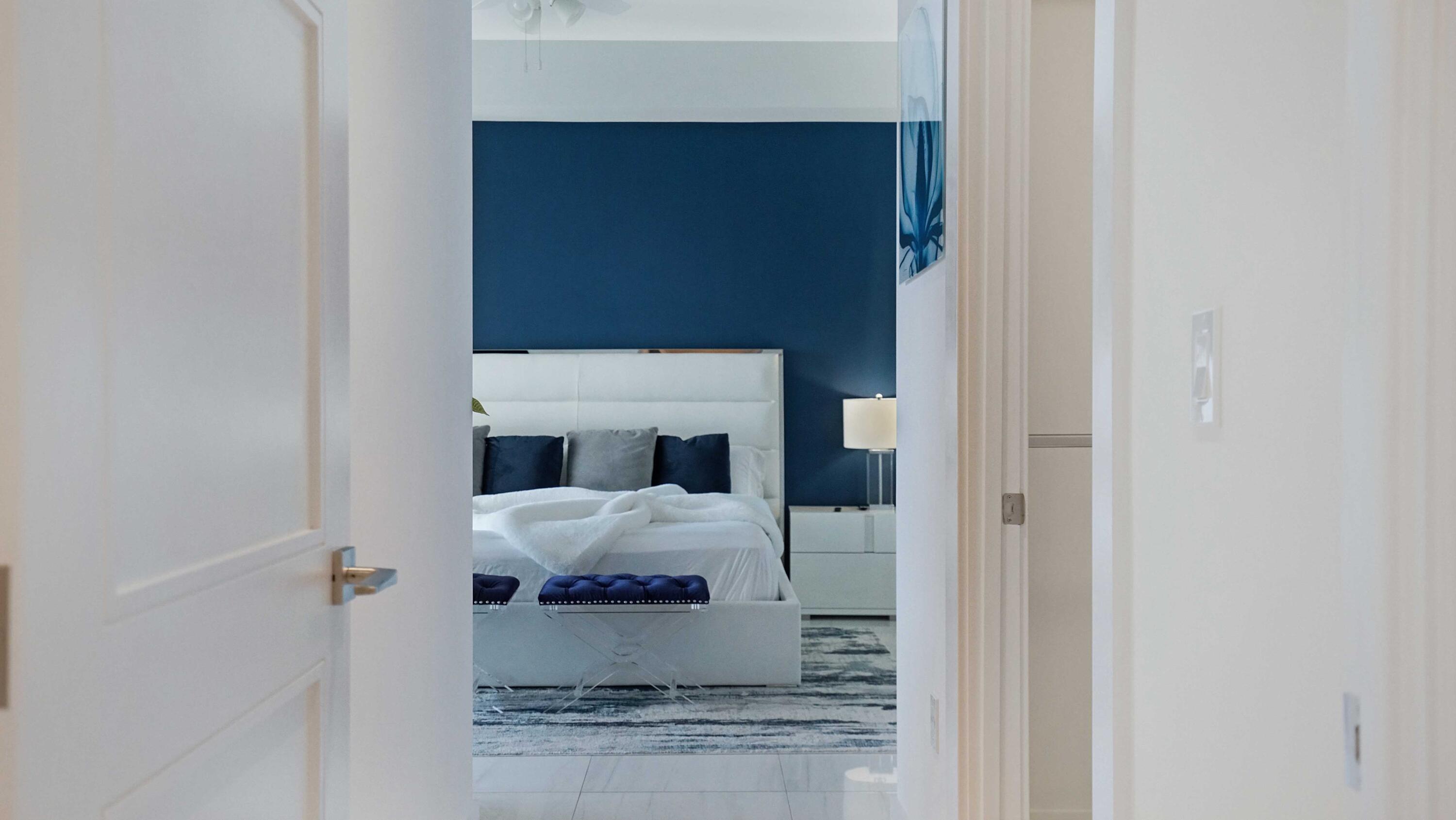 155 East Boca Raton Road, Unit 501 Boca Raton, FL 33432 - Photo 19 of 83 a room with a bed and a mirror