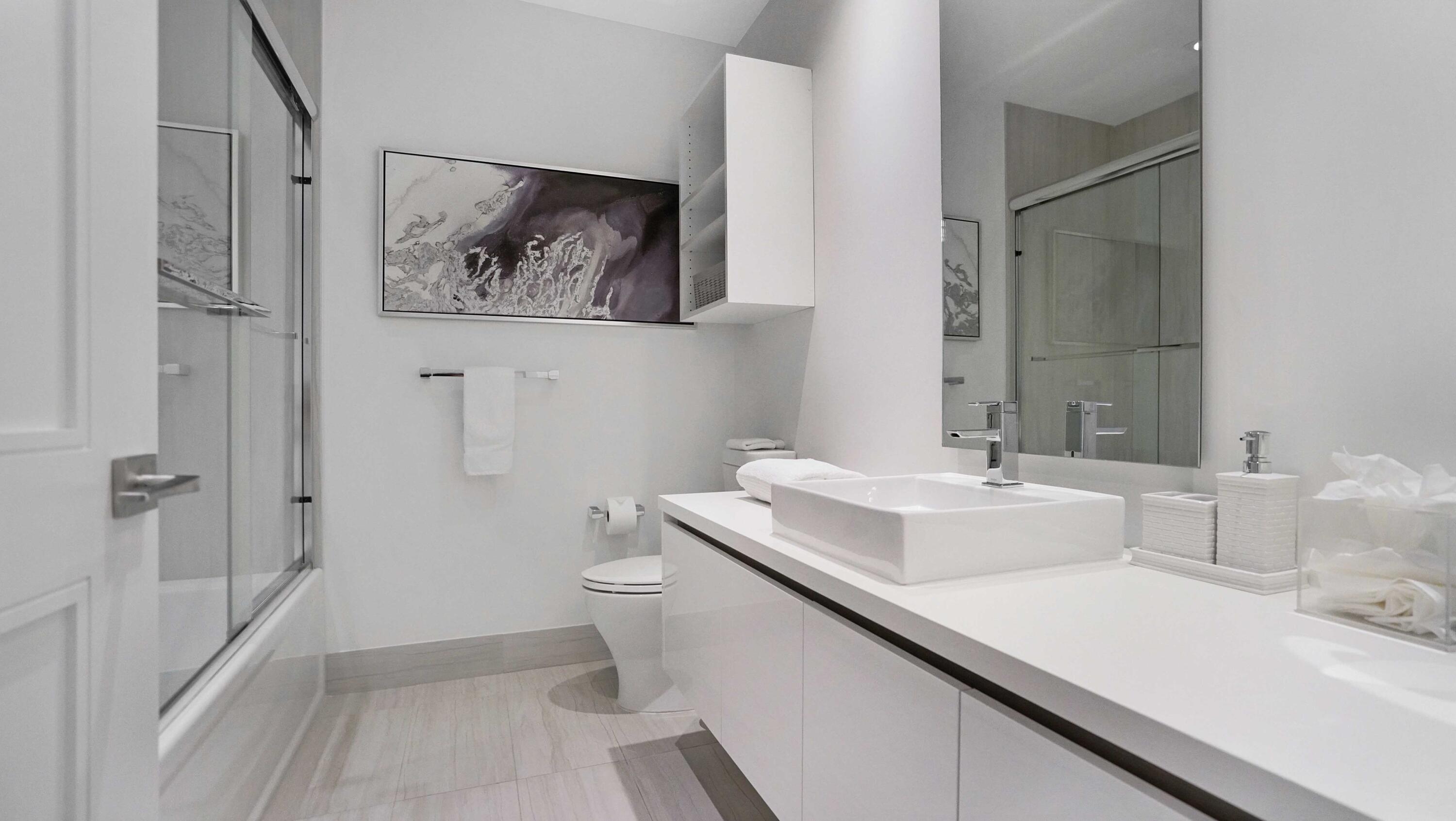 155 East Boca Raton Road, Unit 501 Boca Raton, FL 33432 - Photo 25 of 83 a bathroom with a sink and a mirror