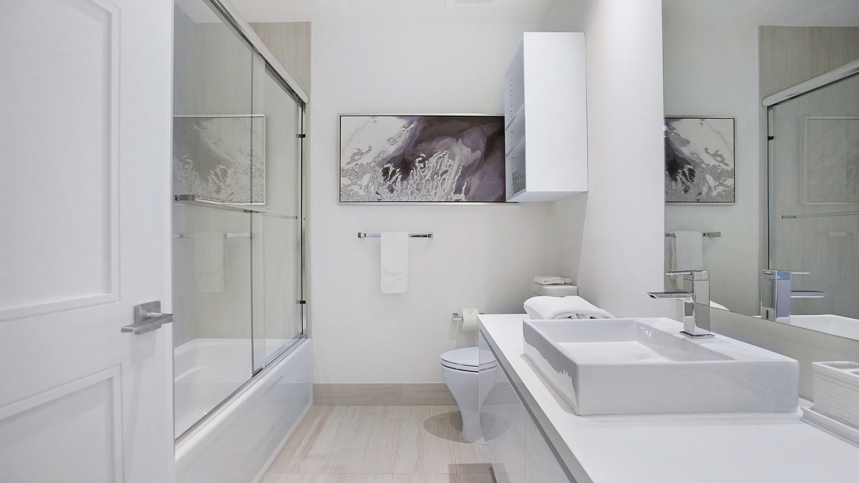 155 East Boca Raton Road, Unit 501 Boca Raton, FL 33432 - Photo 26 of 83 a bathroom with a sink a toilet and a bathtub