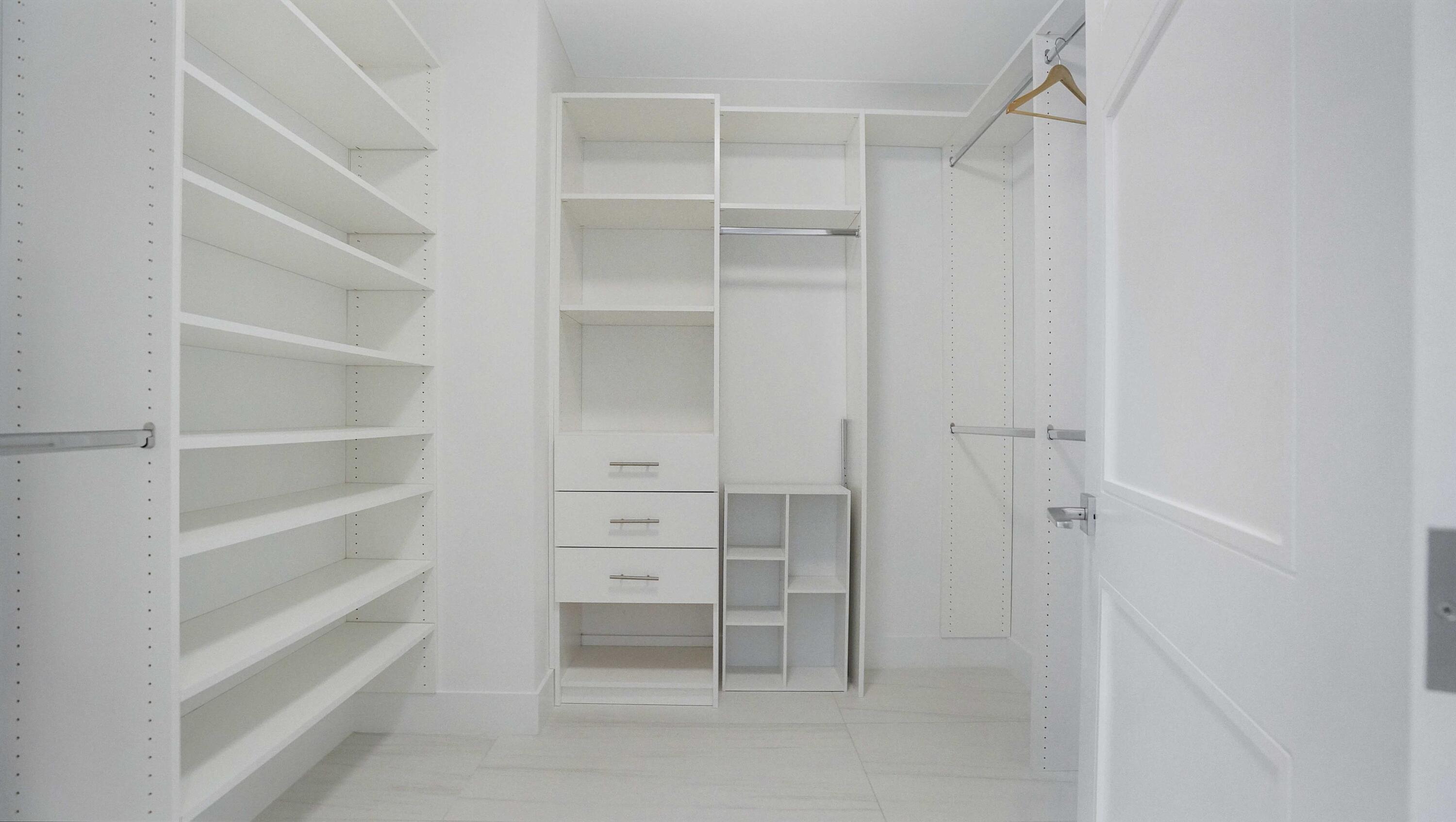 155 East Boca Raton Road, Unit 501 Boca Raton, FL 33432 - Photo 29 of 83 a view of walk in closet with empty racks