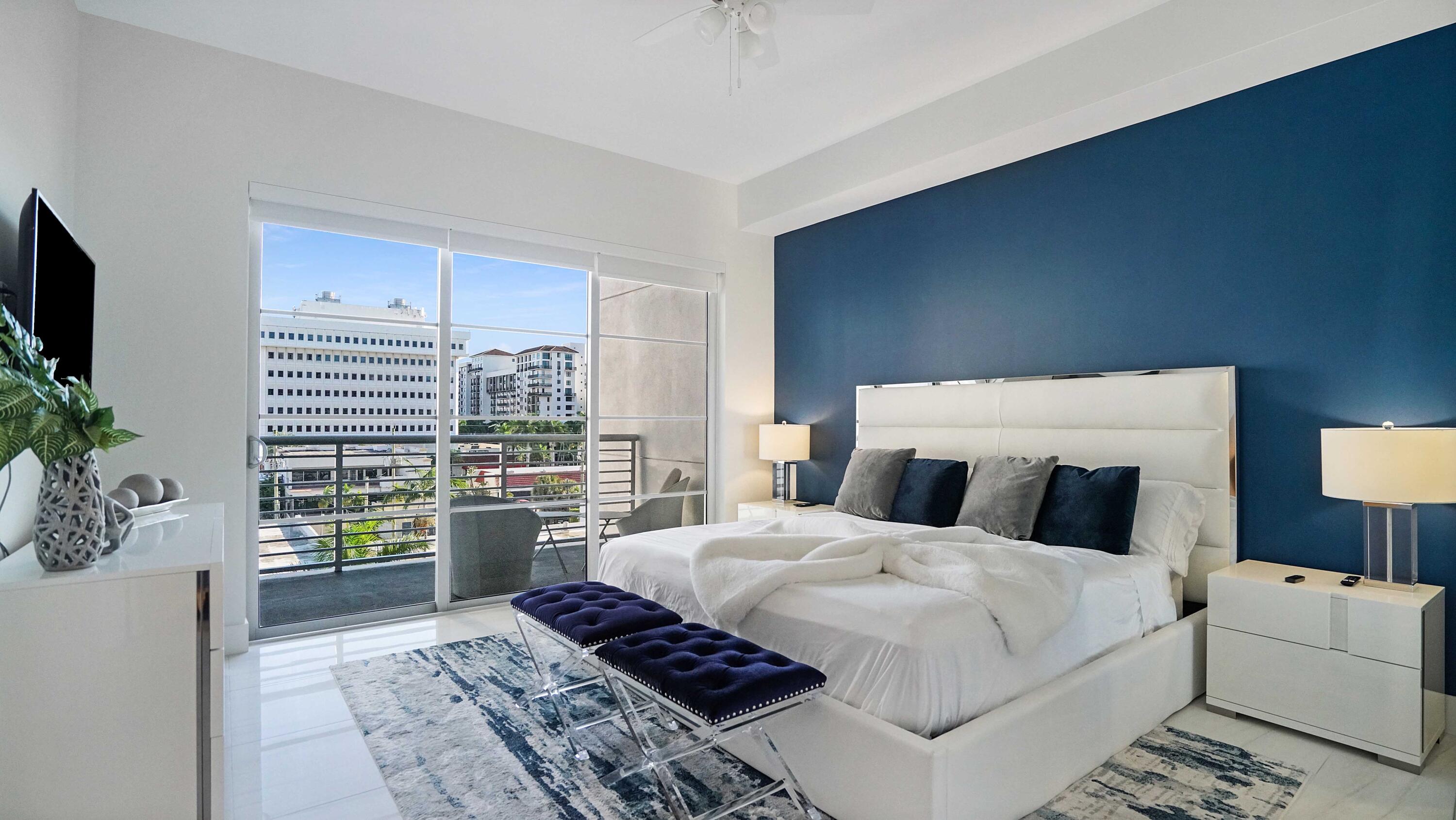 155 East Boca Raton Road, Unit 501 Boca Raton, FL 33432 - Photo 4 of 83 a bedroom with a large bed and a potted plant