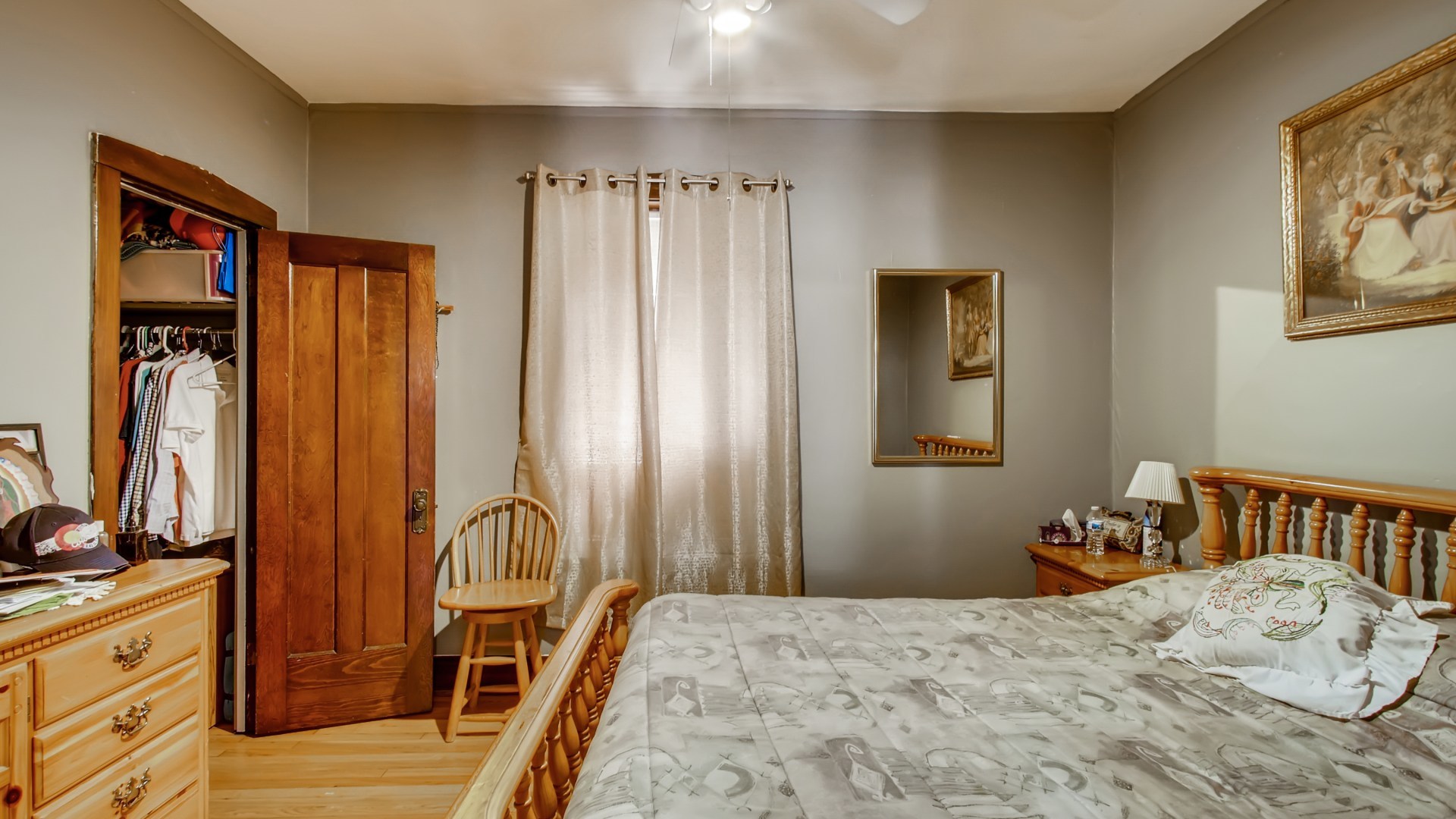 3657 North Lotus Avenue Chicago, IL 60641 - Photo 12 of 29 a bedroom with a bed and a dresser in it