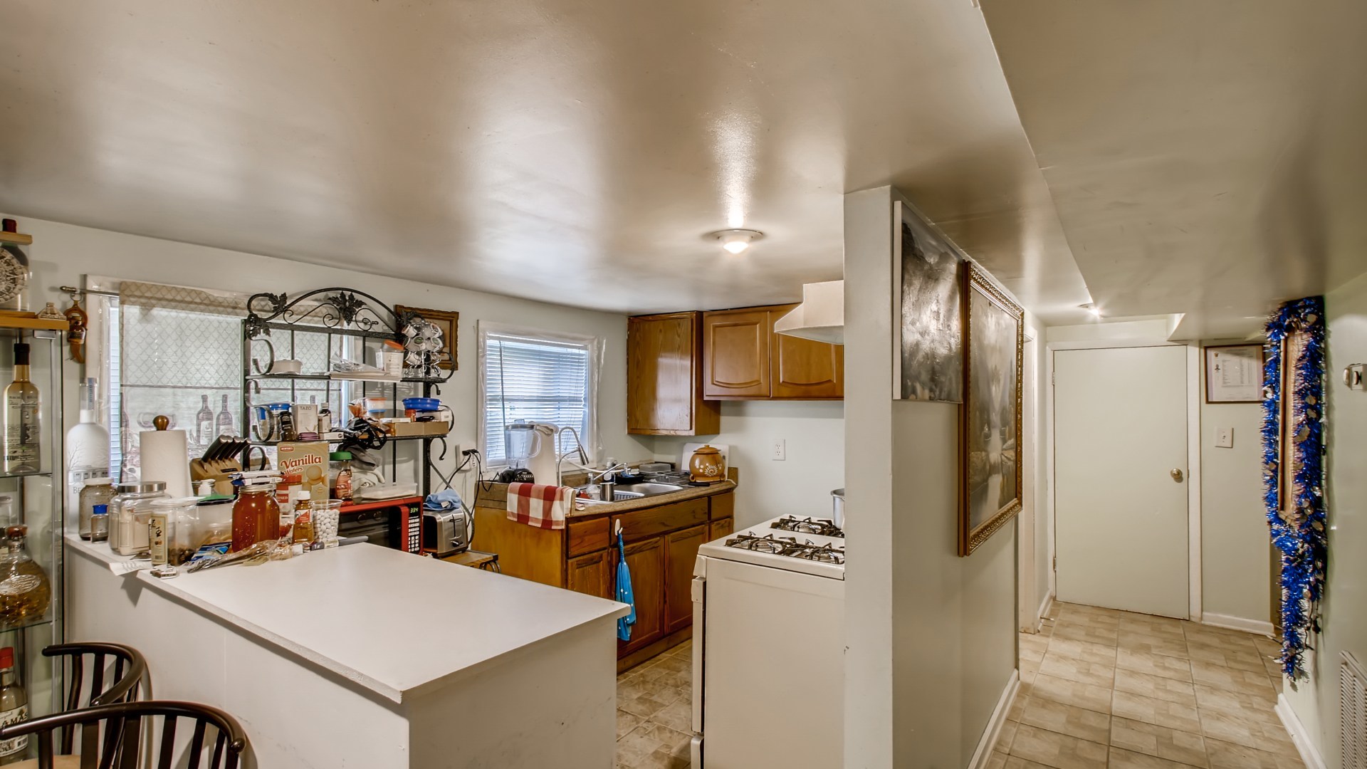 3657 North Lotus Avenue Chicago, IL 60641 - Photo 23 of 29 a kitchen with stainless steel appliances granite countertop a refrigerator and a stove