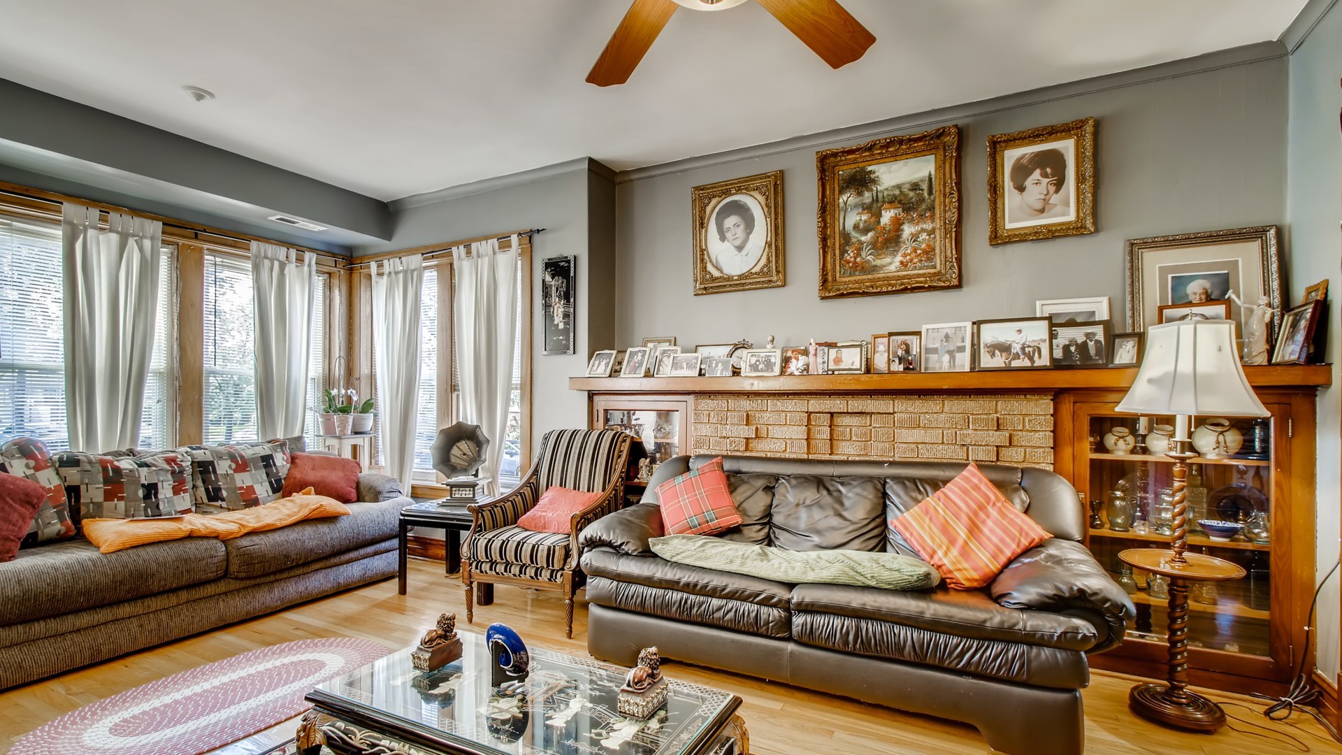 3657 North Lotus Avenue Chicago, IL 60641 - Photo 4 of 29 a living room with furniture and large windows