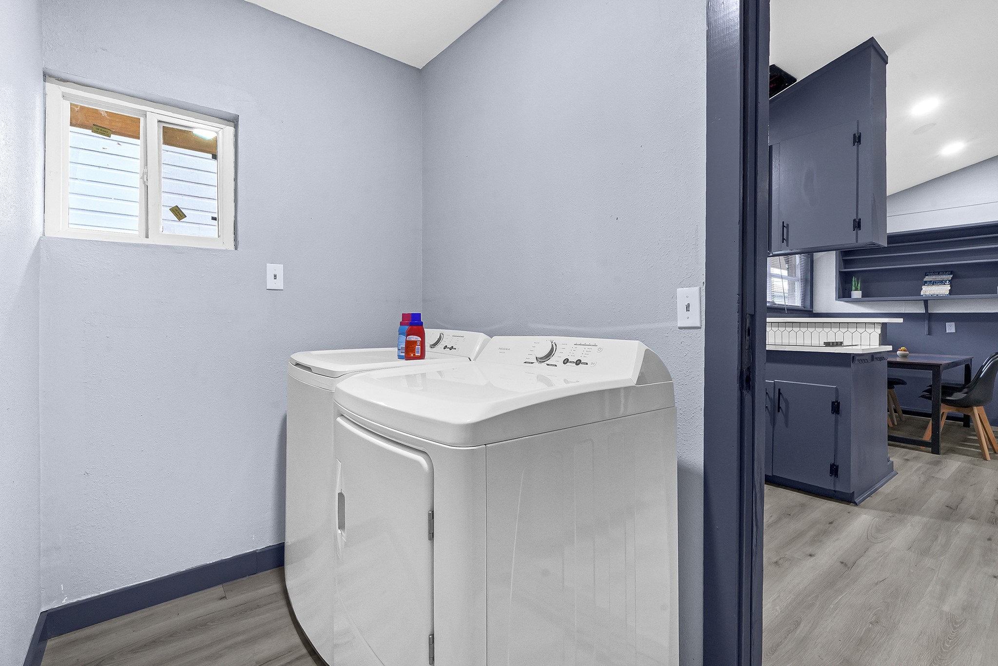 11103 Greenwillow Street Houston, TX 77035 - Photo 11 of 27 a utility room with cabinets washer and dryer