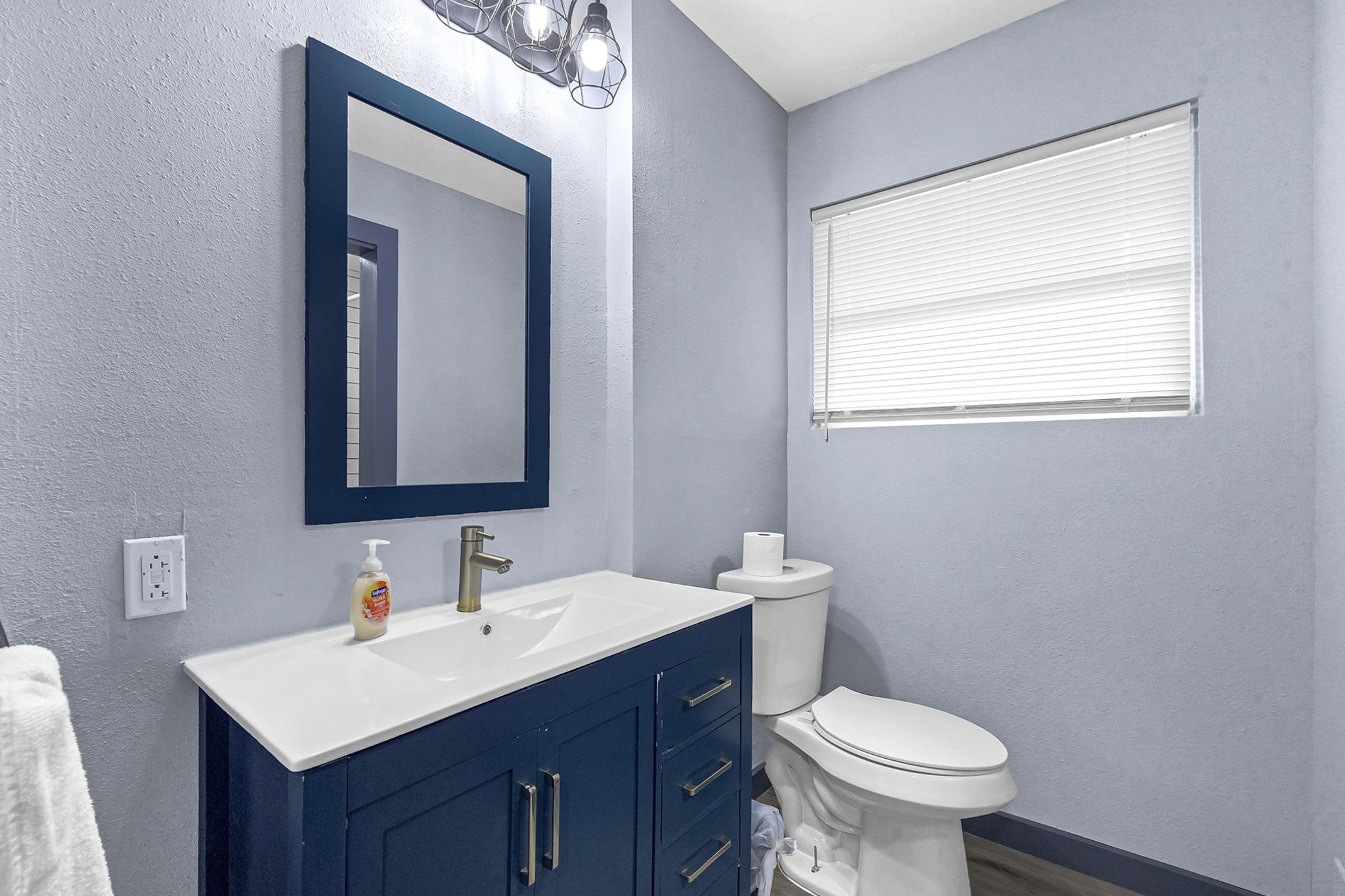11103 Greenwillow Street Houston, TX 77035 - Photo 15 of 27 a bathroom with a sink toilet and mirror