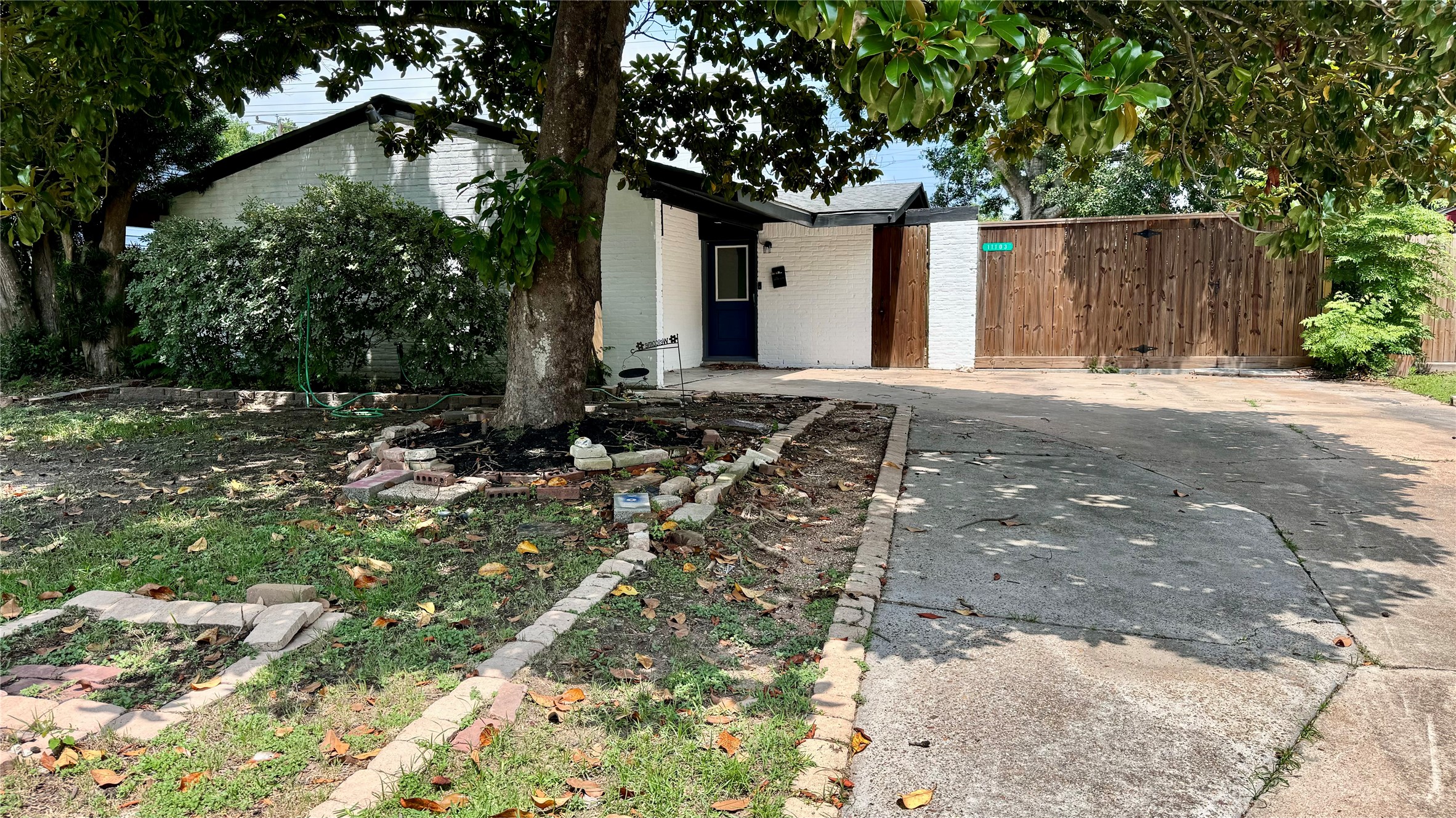 11103 Greenwillow Street Houston, TX 77035 - Photo 27 of 27 a front view of a house with a yard