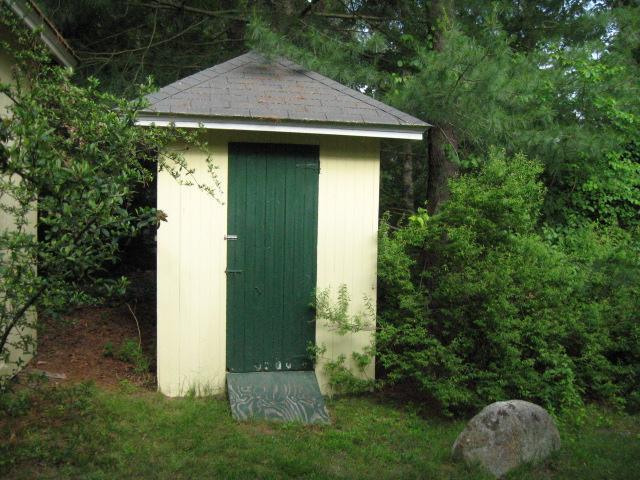 5 Squeteague Harbor Road Cataumet, MA 02534 - Photo 14 of 16 a view of a tiny house with yard