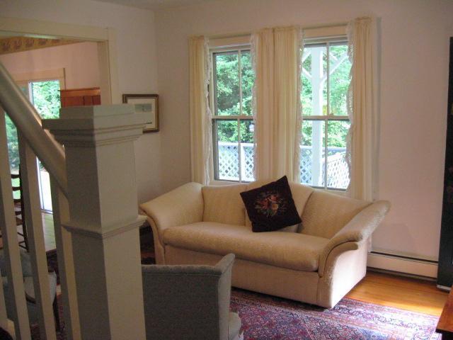 5 Squeteague Harbor Road Cataumet, MA 02534 - Photo 3 of 16 a living room with furniture and a window