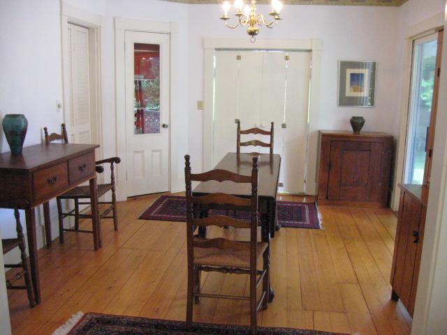 5 Squeteague Harbor Road Cataumet, MA 02534 - Photo 7 of 16 a view of a dining room with furniture
