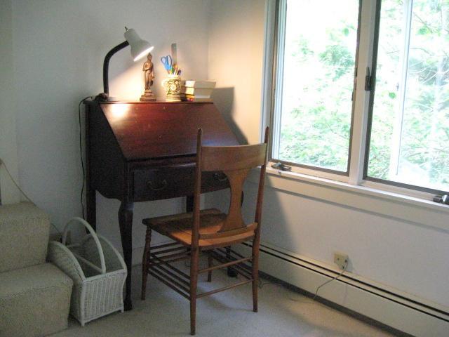 5 Squeteague Harbor Road Cataumet, MA 02534 - Photo 9 of 16 a room with furniture and a window