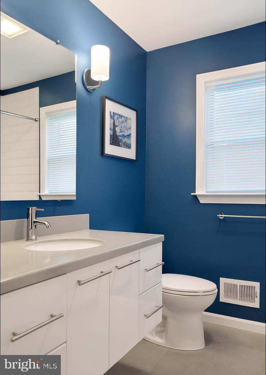3 Carey Street Pennington, NJ 08534 - Photo 19 of 23 a bathroom with a toilet sink and mirror