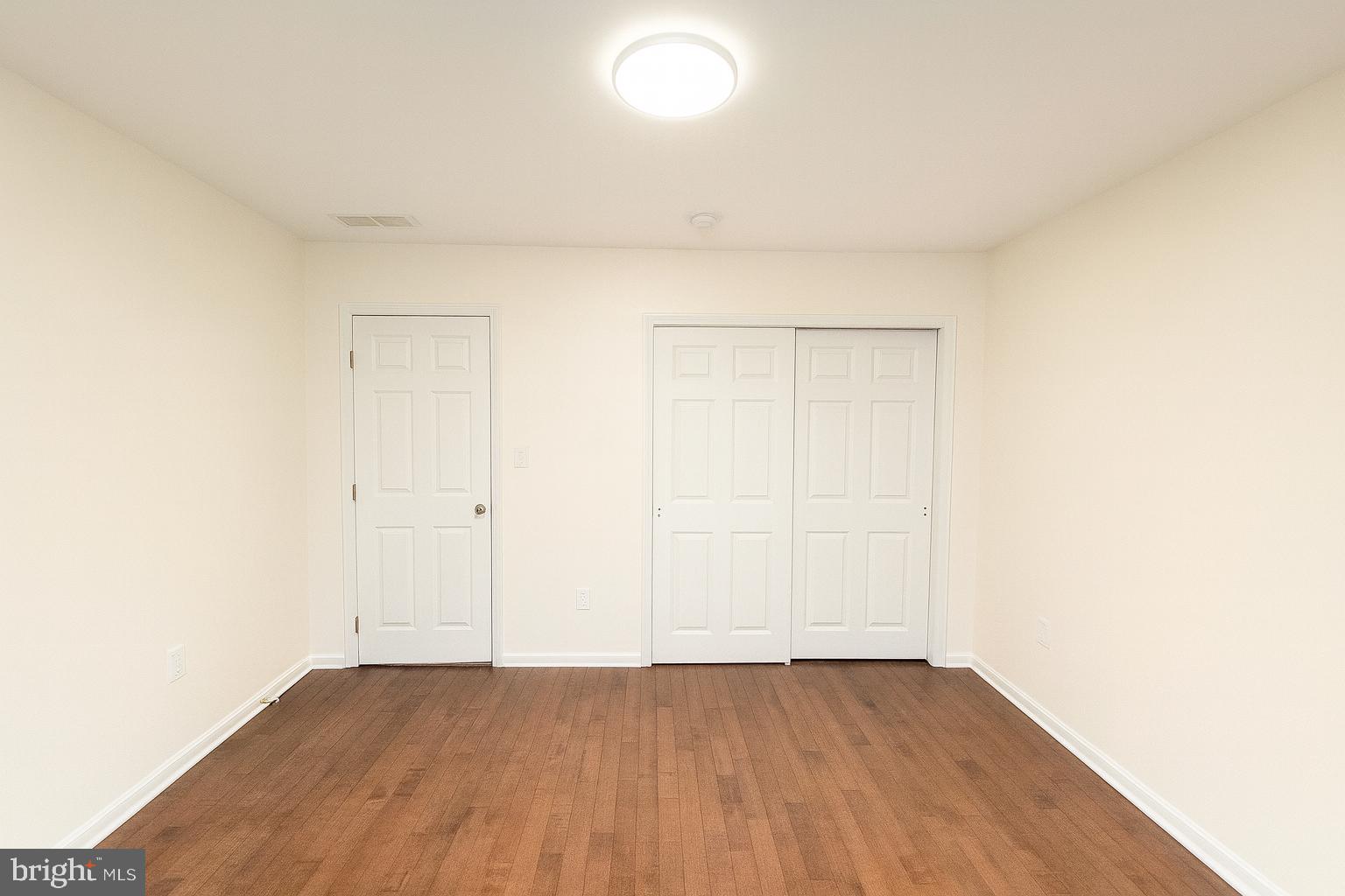 3 Carey Street Pennington, NJ 08534 - Photo 21 of 23 a view of an empty room and wooden floor