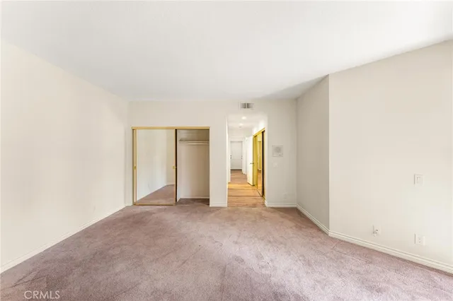 an empty room with a natural light