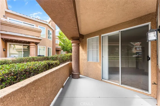 a view of a house with a large window