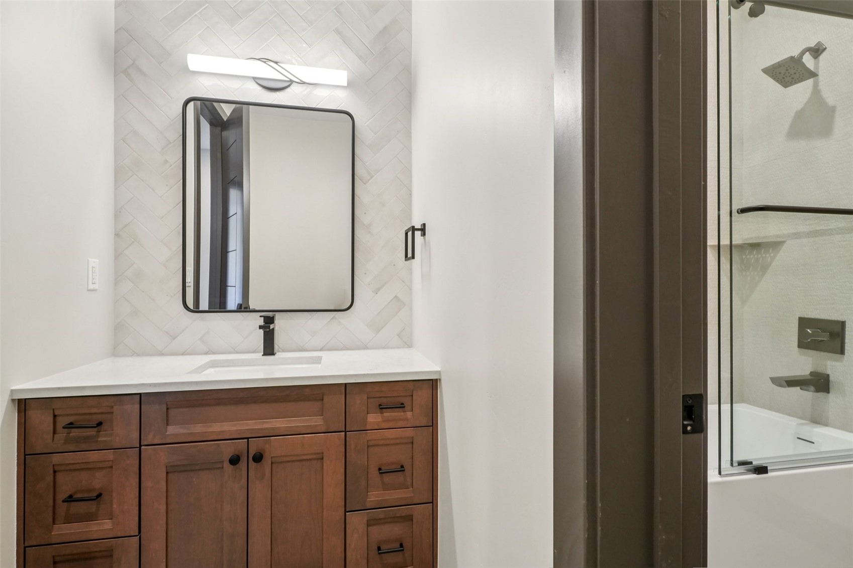 1325 Golden Eagle Road Silverthorne, CO 80498 - Photo 15 of 46 a bathroom with a sink vanity and a mirror