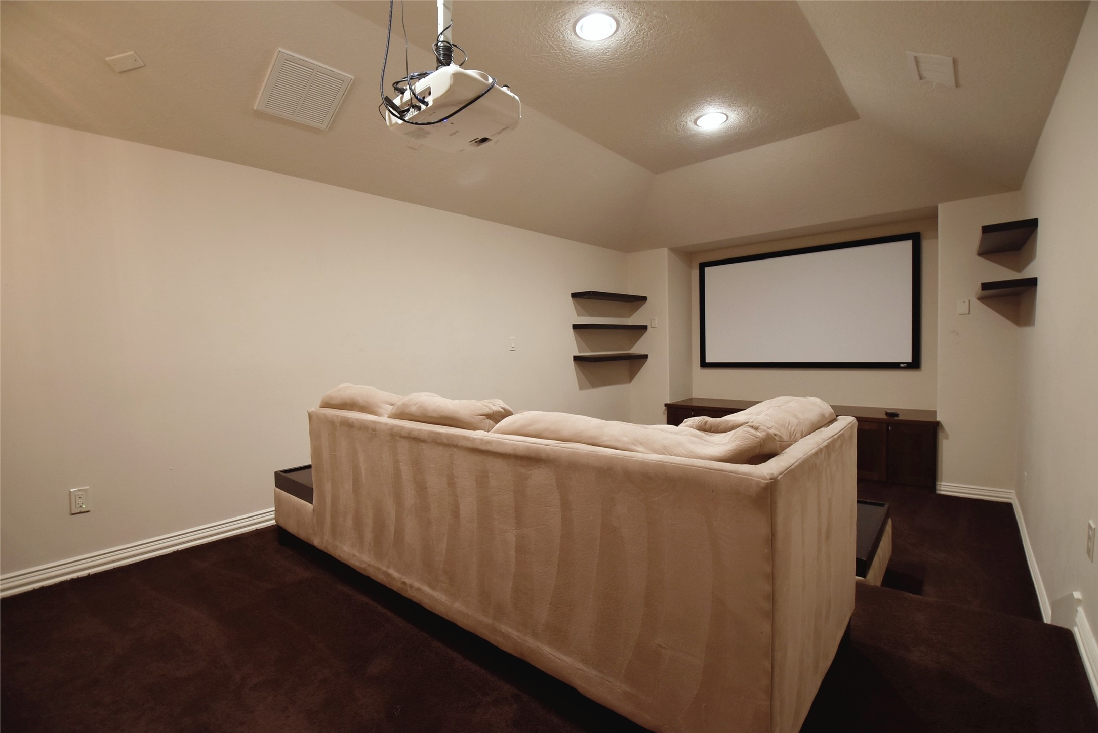 2014 Split Branch Court Houston, TX 77077 - Photo 28 of 47 a living room with a couch and a flat screen tv