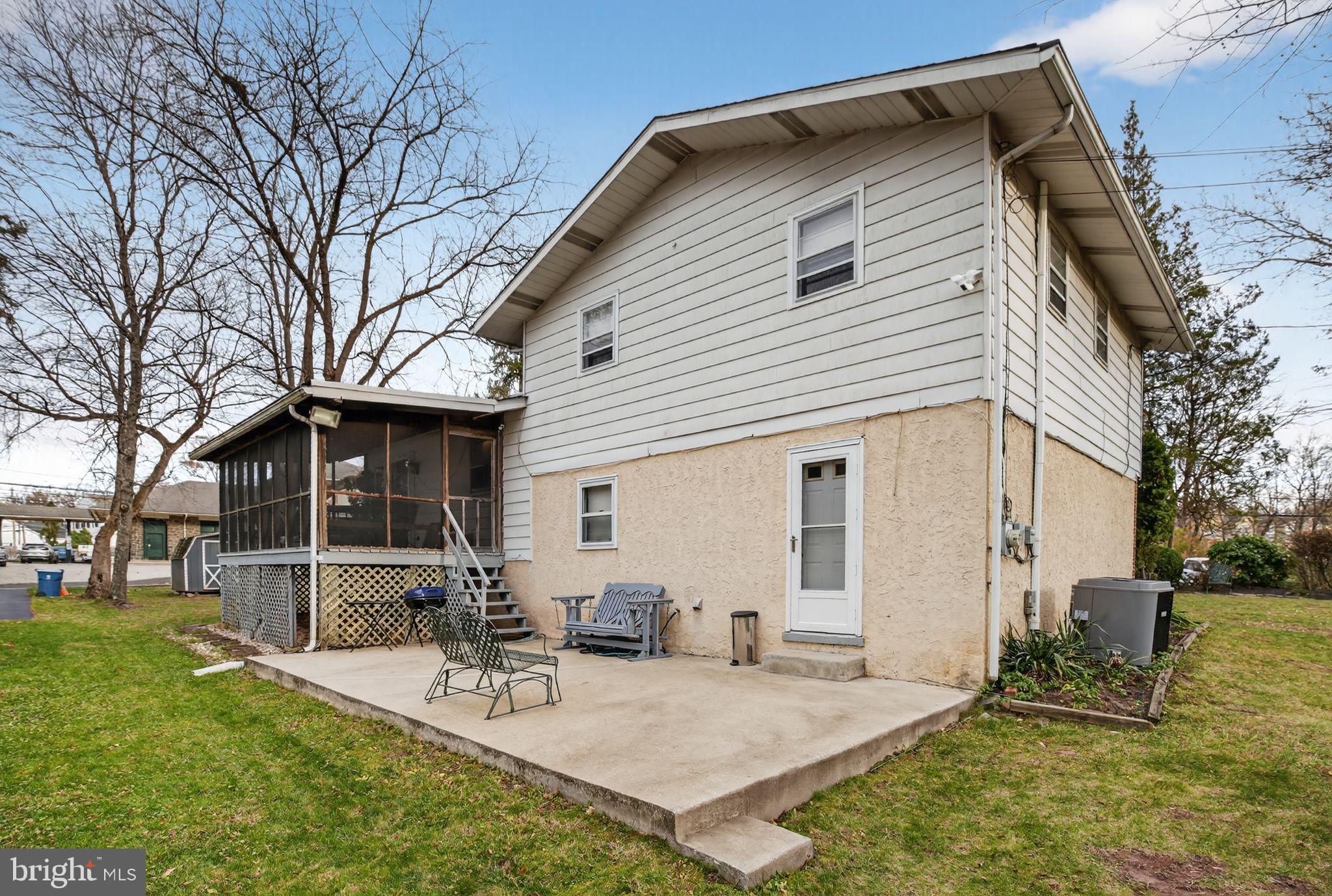 908 Pershing Road Blue Bell, PA 19422 - Photo 2 of 24 a view of backyard of house with outdoor seating