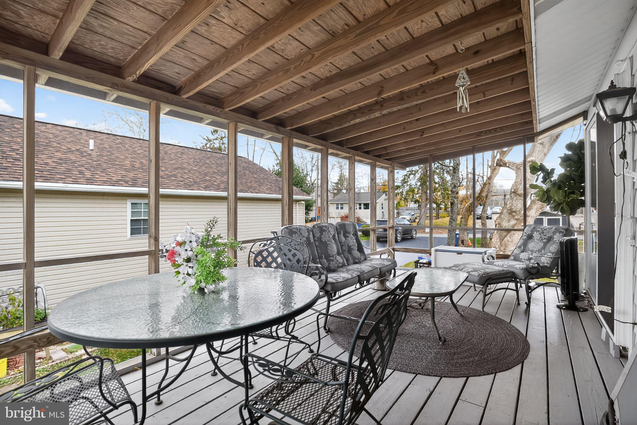 908 Pershing Road Blue Bell, PA 19422 - Photo 5 of 24 a outdoor dining space with furniture and outdoor view