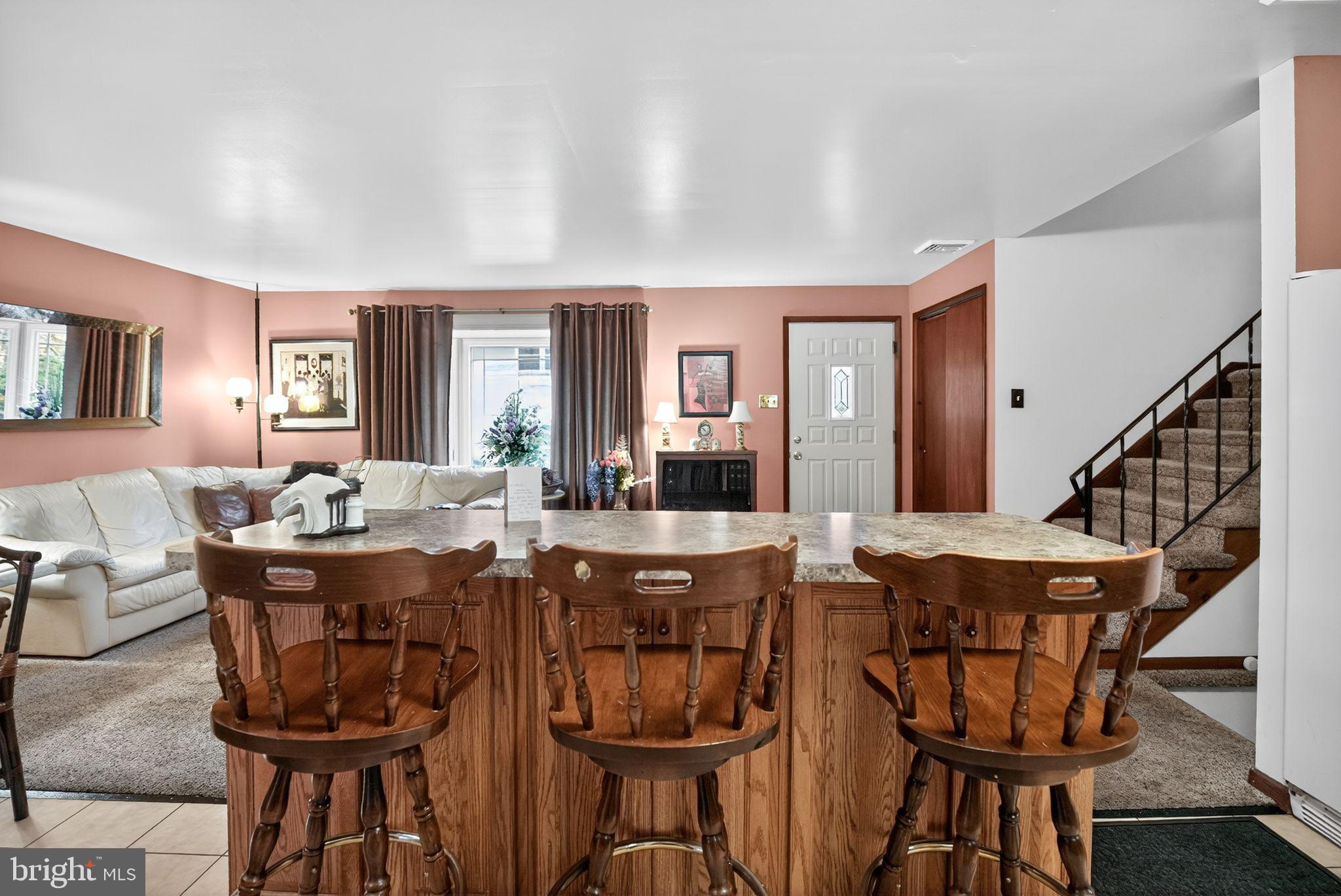 908 Pershing Road Blue Bell, PA 19422 - Photo 10 of 24 a view of a dining room with furniture and chandelier