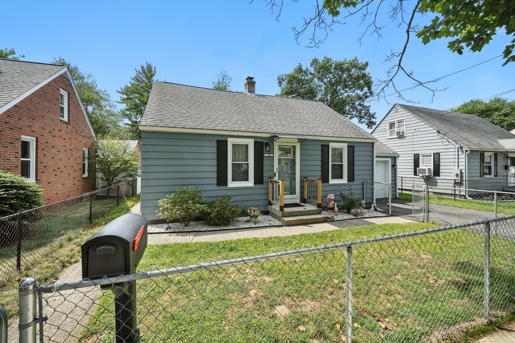 130 Eddy Street Springfield, MA 01104 - Photo 3 of 24 a view of house with swimming pool and a yard