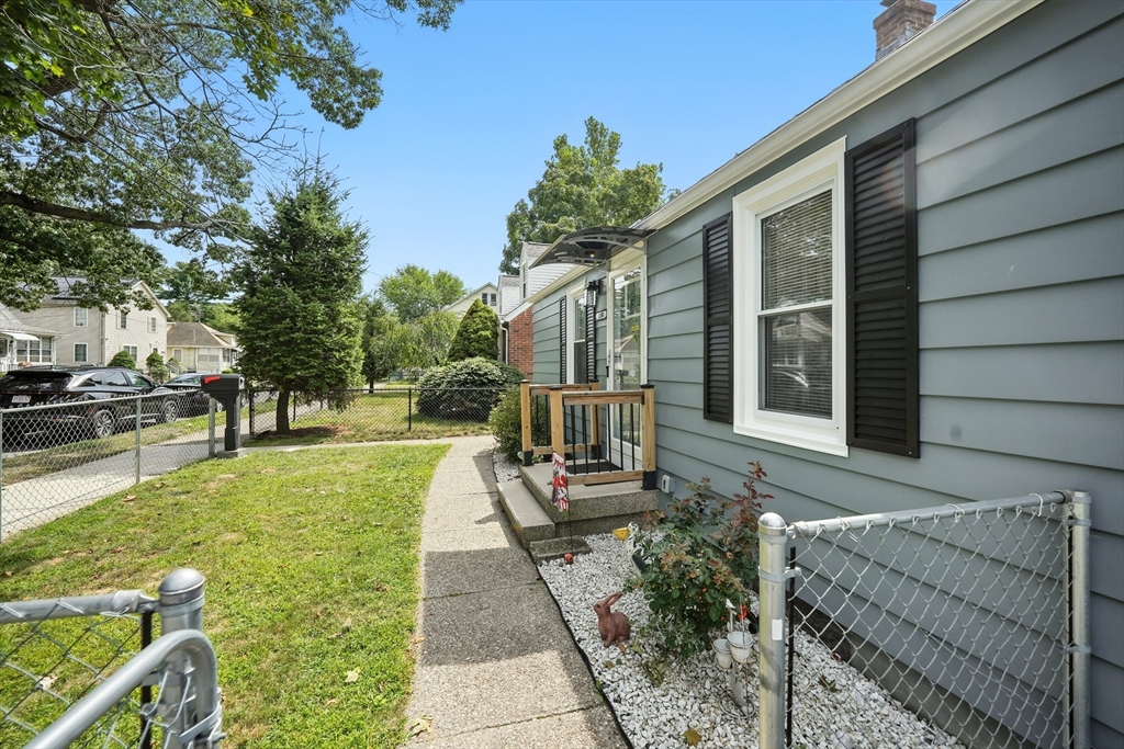 130 Eddy Street Springfield, MA 01104 - Photo 4 of 24 a view of a house with backyard