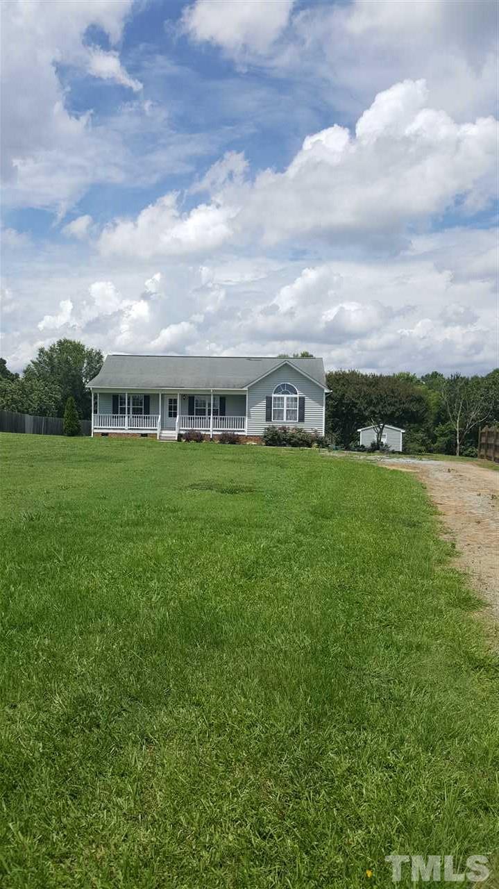 668 Slate Top House Road Clayton, NC 27520 - Photo 1 of 27 Home Sits Back a Comfortable Distance from the Road! Huge Front Lawn is so inviting.