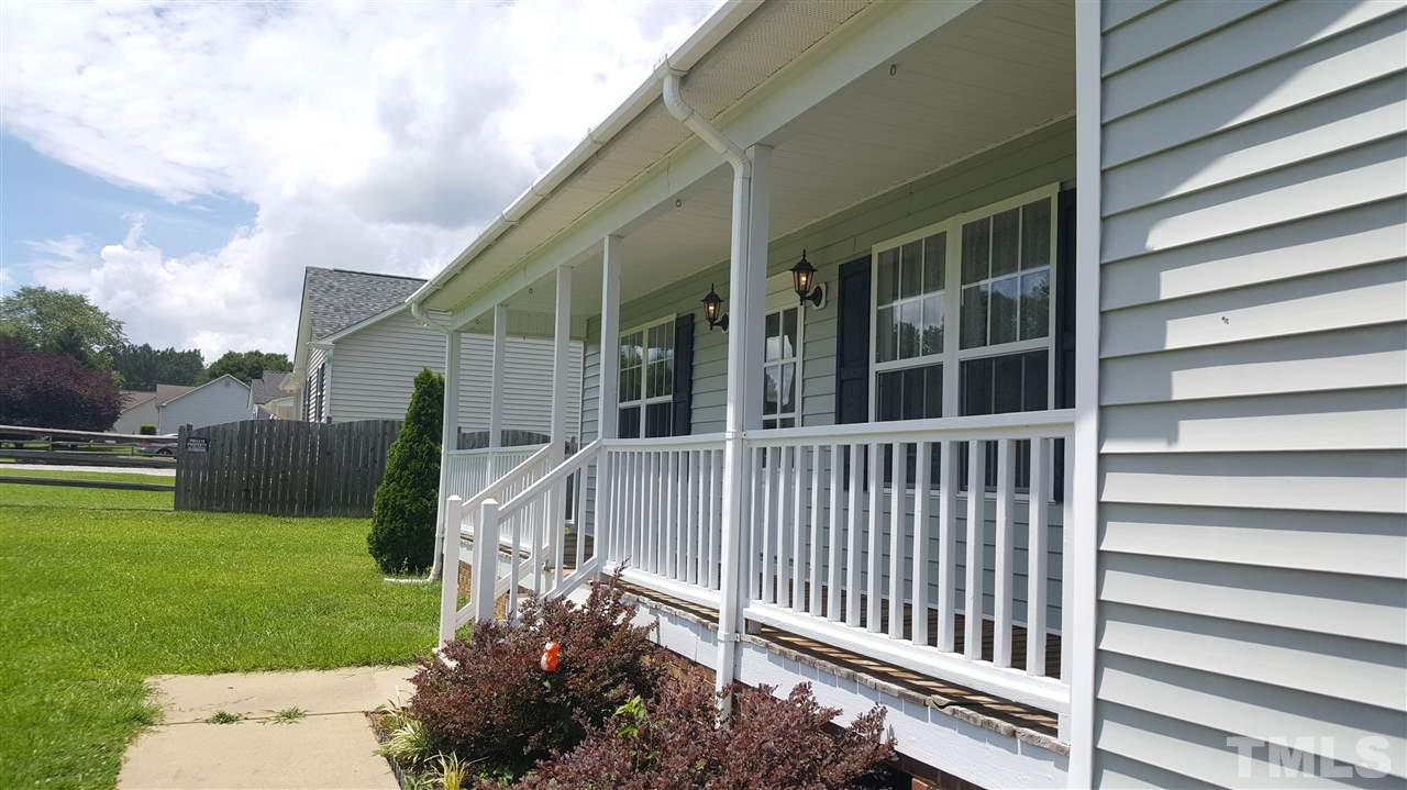 668 Slate Top House Road Clayton, NC 27520 - Photo 2 of 27 This lovely walkway leads up to the Welcoming 31 x 5 foot Front Porch. Perfect for Rocking or swinging.