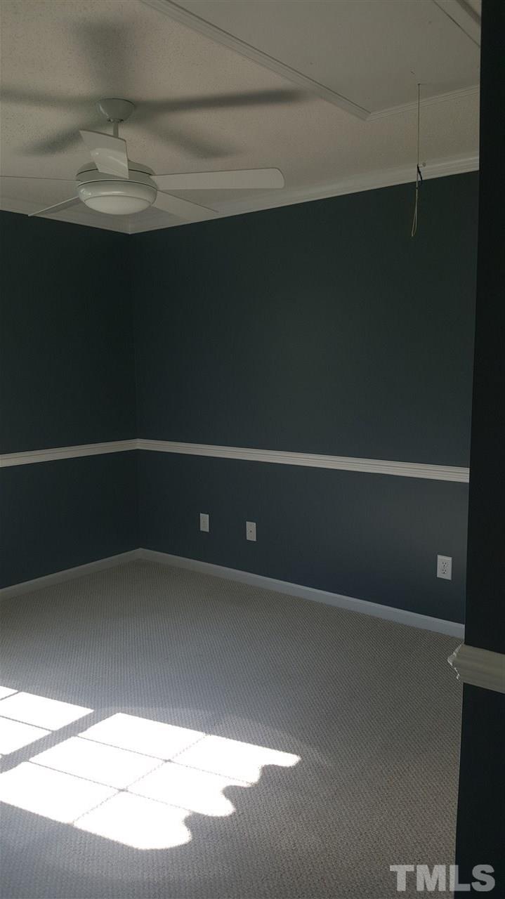 668 Slate Top House Road Clayton, NC 27520 - Photo 25 of 27 Back Bedroom is spacious.