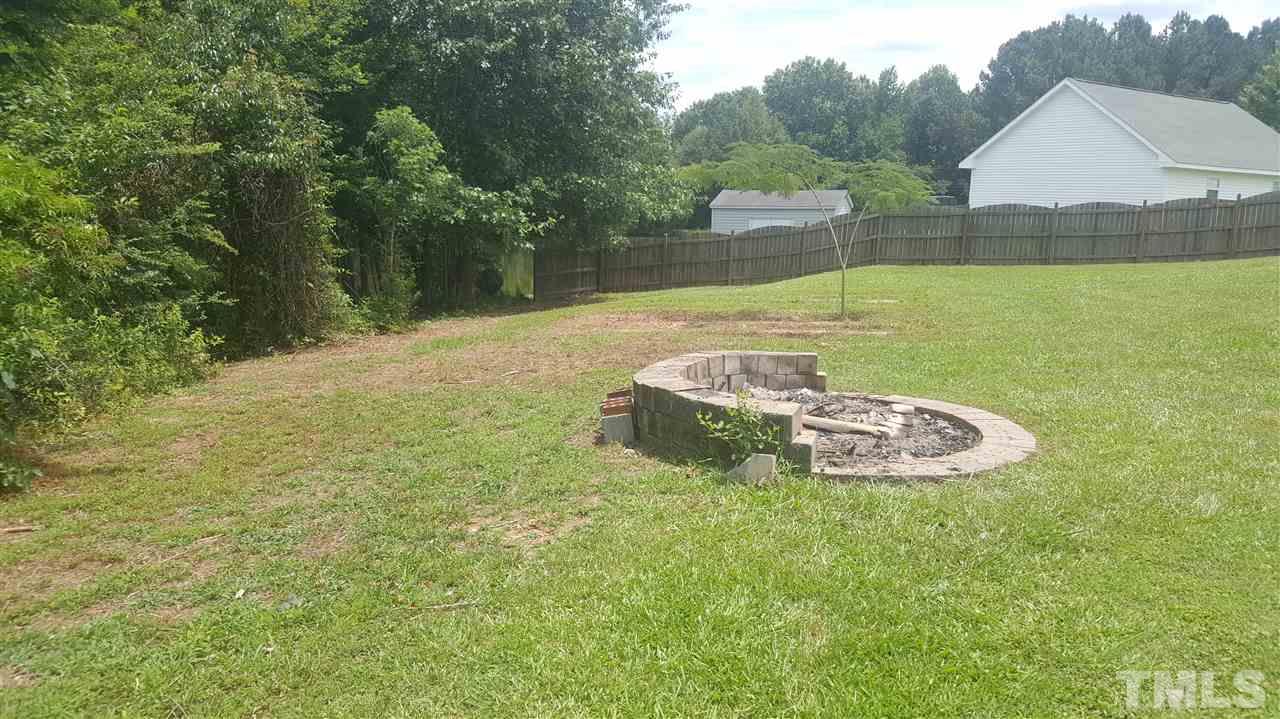 668 Slate Top House Road Clayton, NC 27520 - Photo 8 of 27 Nice Fire Pit! Perfect for the Campfire in You!