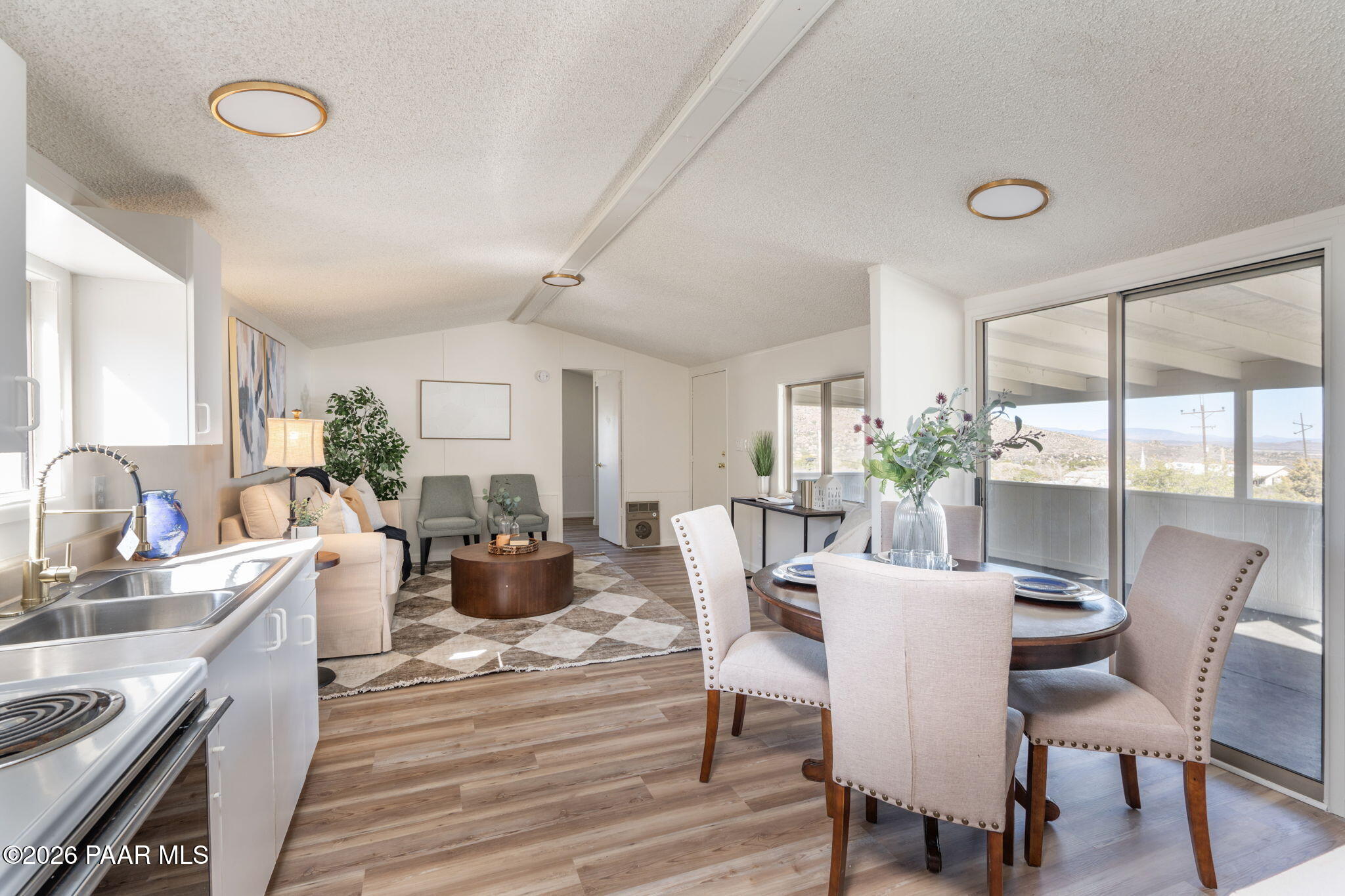 22673 Crest Way Yarnell, AZ 85362 - Photo 3 of 24 a view of a dining room with furniture window and outside view