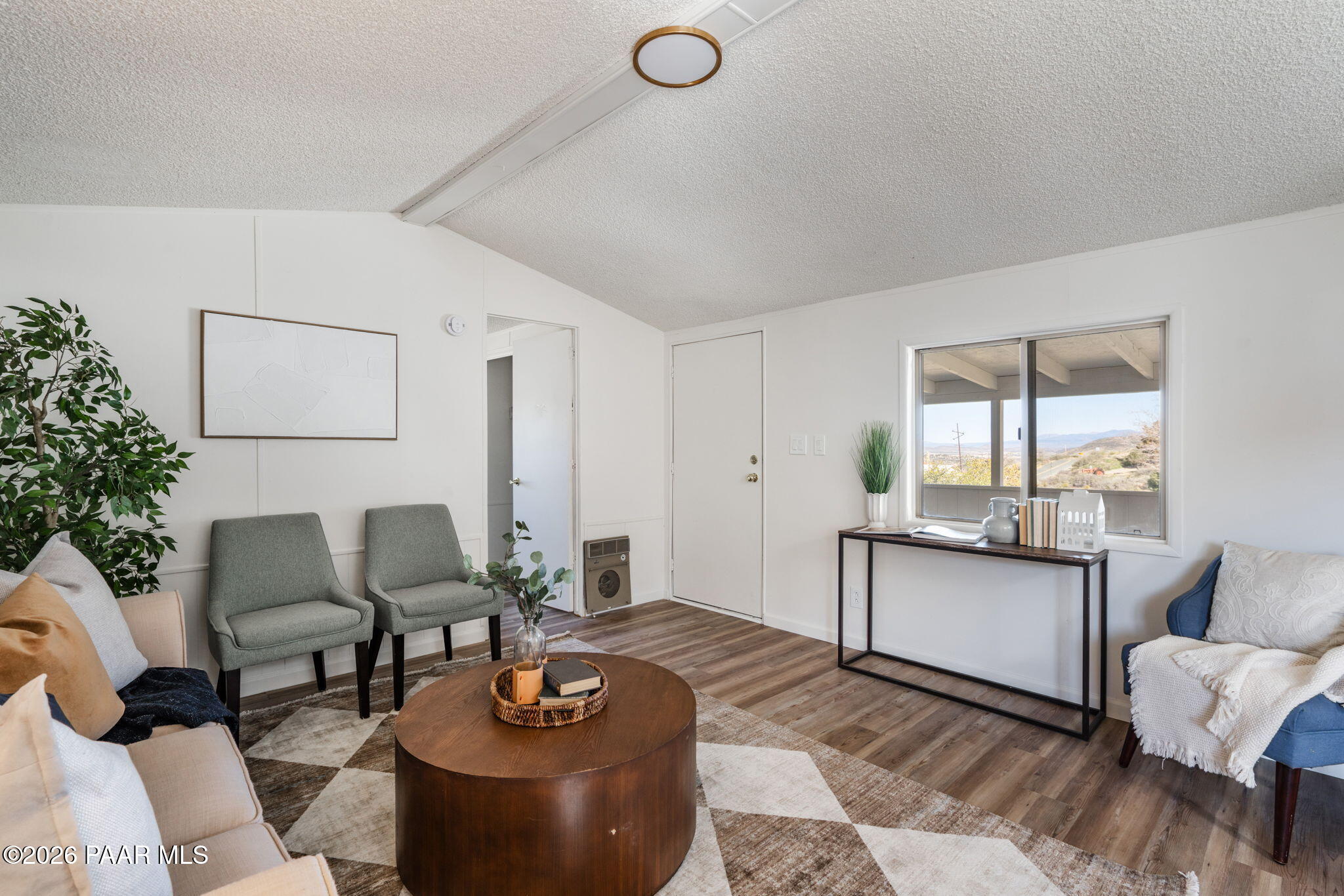 22673 Crest Way Yarnell, AZ 85362 - Photo 6 of 24 a living room with furniture and a large window
