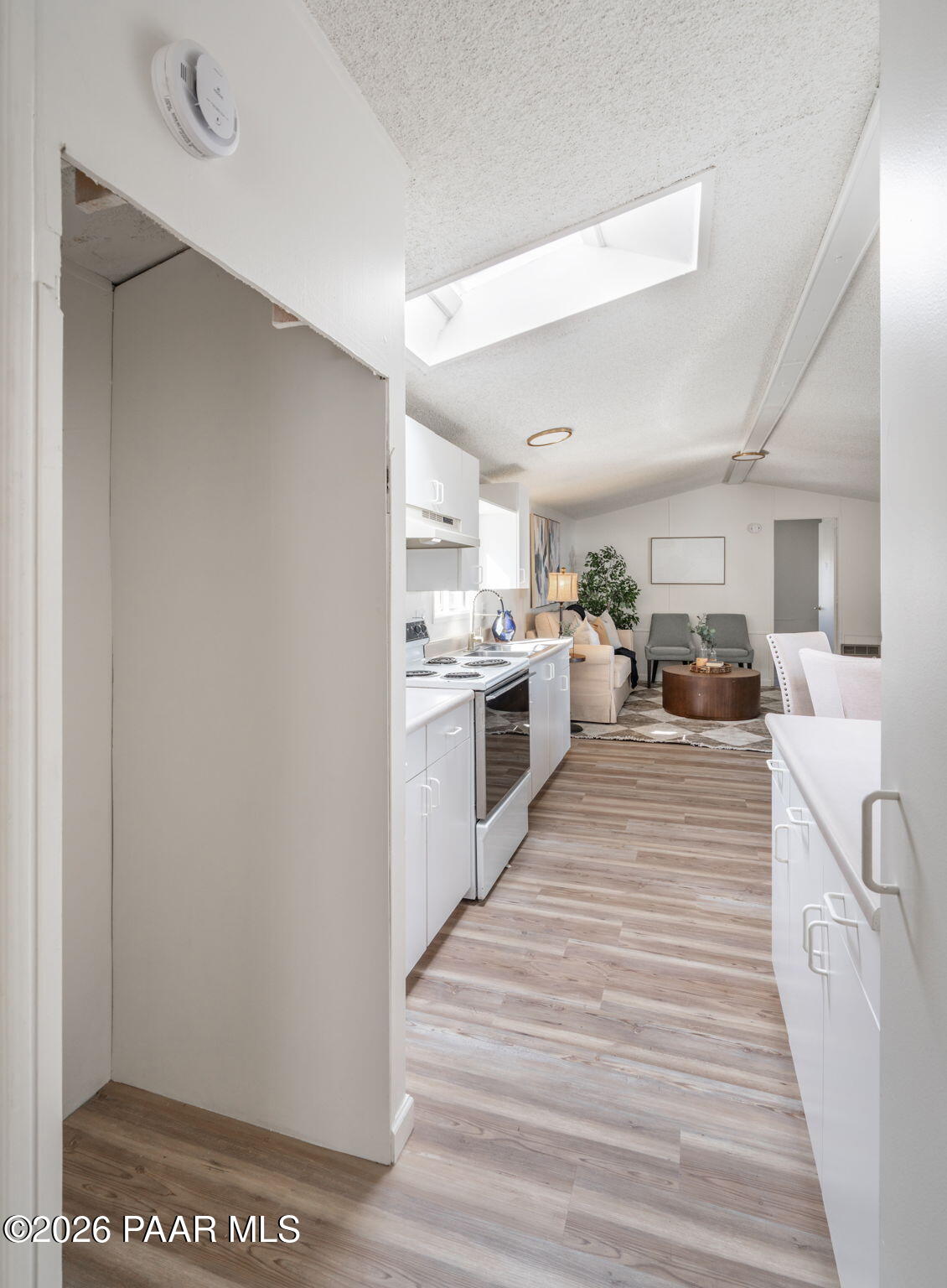 22673 Crest Way Yarnell, AZ 85362 - Photo 9 of 24 a kitchen with stainless steel appliances granite countertop a stove and a refrigerator