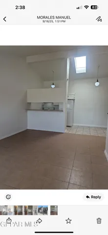 a kitchen with a cabinets and window