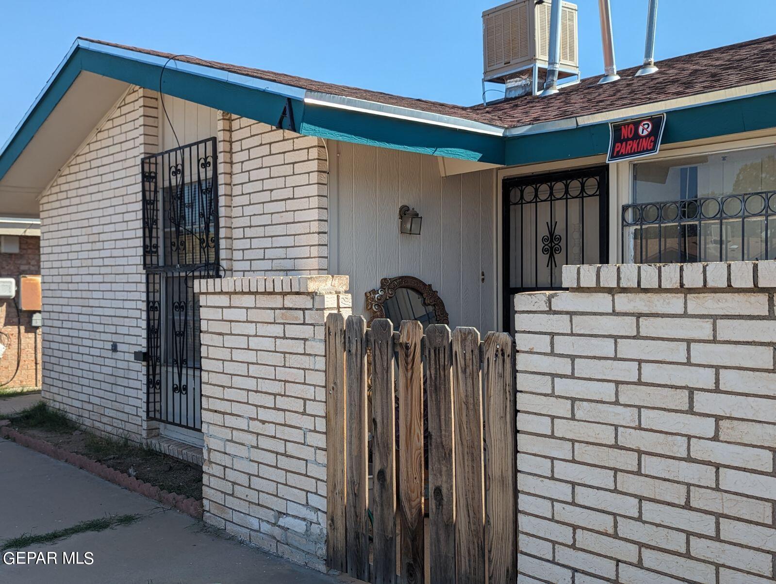 8138 St Andrew Lane, Unit ABCD El Paso, TX 79907 - Photo 2 of 18 a view of a house with large windows