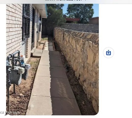 a hallway with sliding door and yard