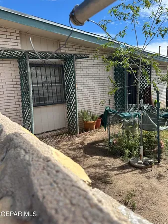 a front view of a house with garage