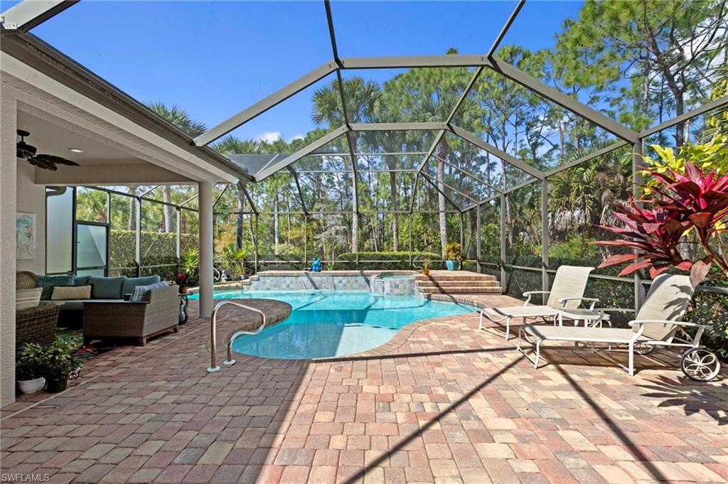 22043 Sycamore Grove Estero, FL 34135 - Photo 34 of 44 a view of swimming pool with outdoor seating