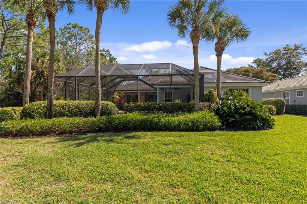 22043 Sycamore Grove Estero, FL 34135 - Photo 40 of 44 a view of a house with a garden